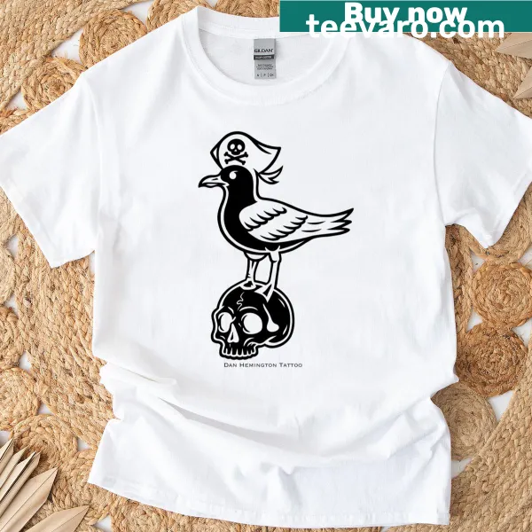Premium t-shirt featuring a cartoon pirate, seagull, and skull design