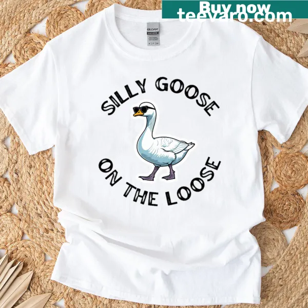 Oversized t-shirt with black text saying 'Silly Goose On The Loose'