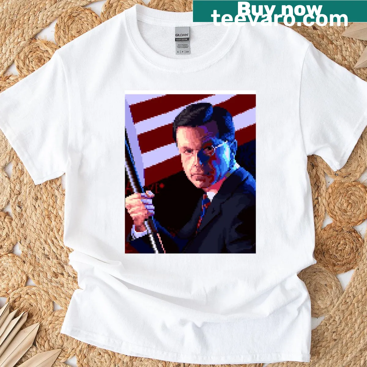 Pixel art graphic t-shirt featuring Stephen Colbert in a patriotic theme — on a men's t-shirt