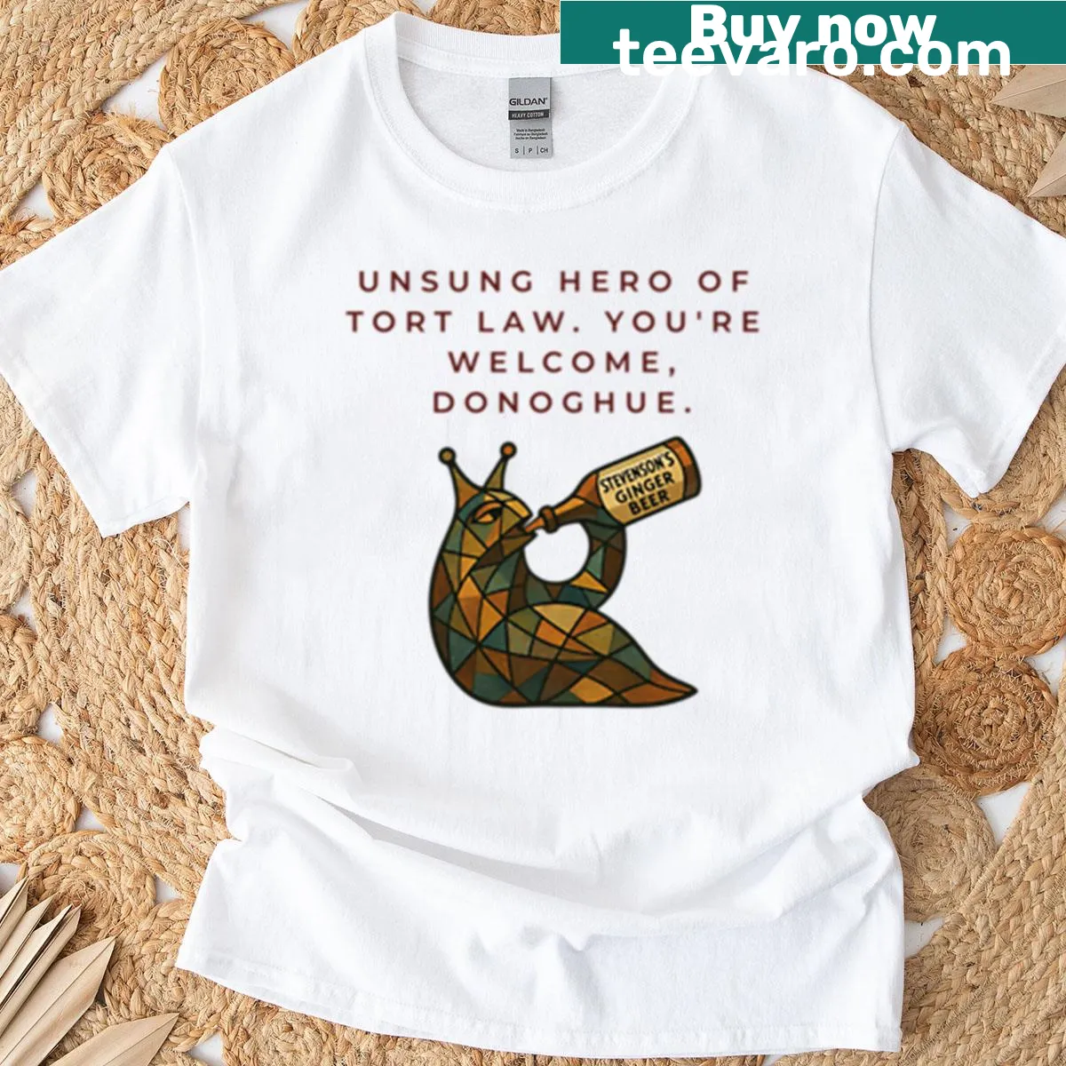 Oversized T-shirt with text 'Unsung Hero Of Tort Law, You're Welcome Donoghue' — on a men's t-shirt