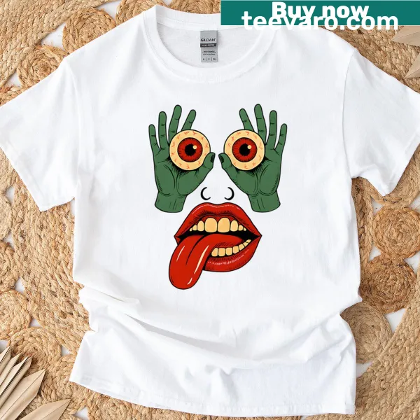 T-shirt featuring zombie hands holding eyeballs graphic