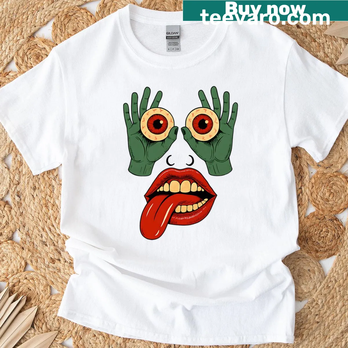 T-shirt featuring zombie hands holding eyeballs graphic — on a men's t-shirt