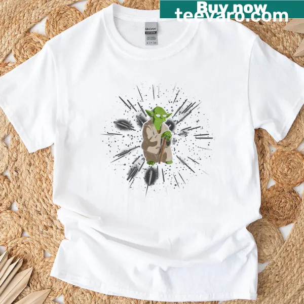 Vintage-style cartoon graphic of Yoda wielding a lightsaber on a black t-shirt.