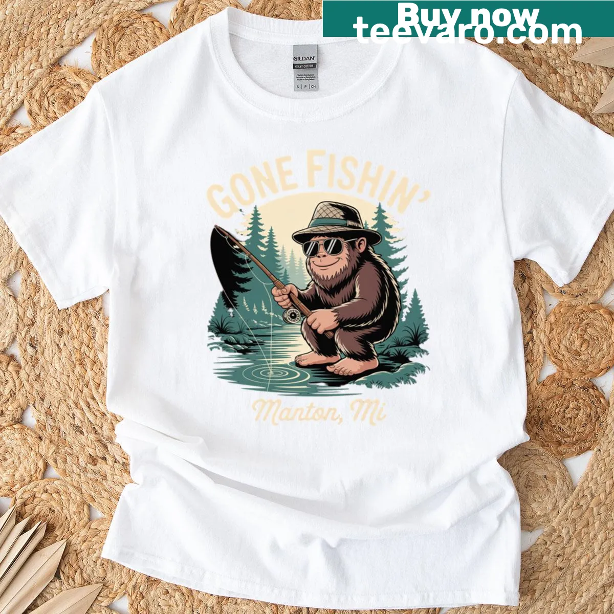 Sasquatch fishing t-shirt featuring an illustration of Bigfoot — on a men's t-shirt