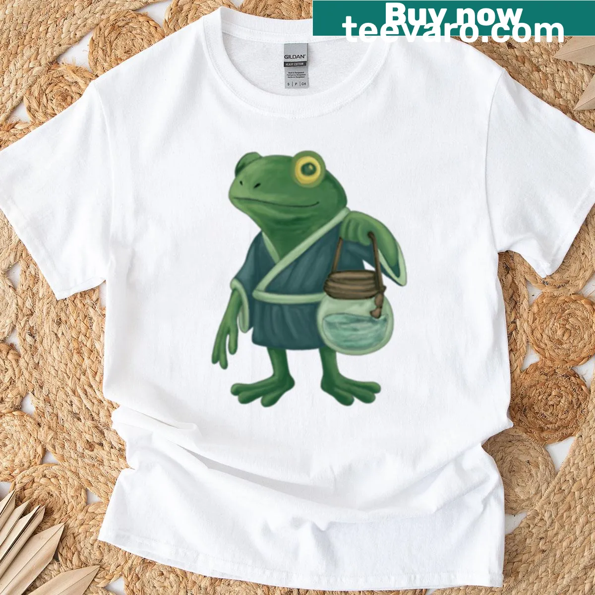 Oversized T-shirt with a cute cartoon frog splashing in water — on a men's t-shirt