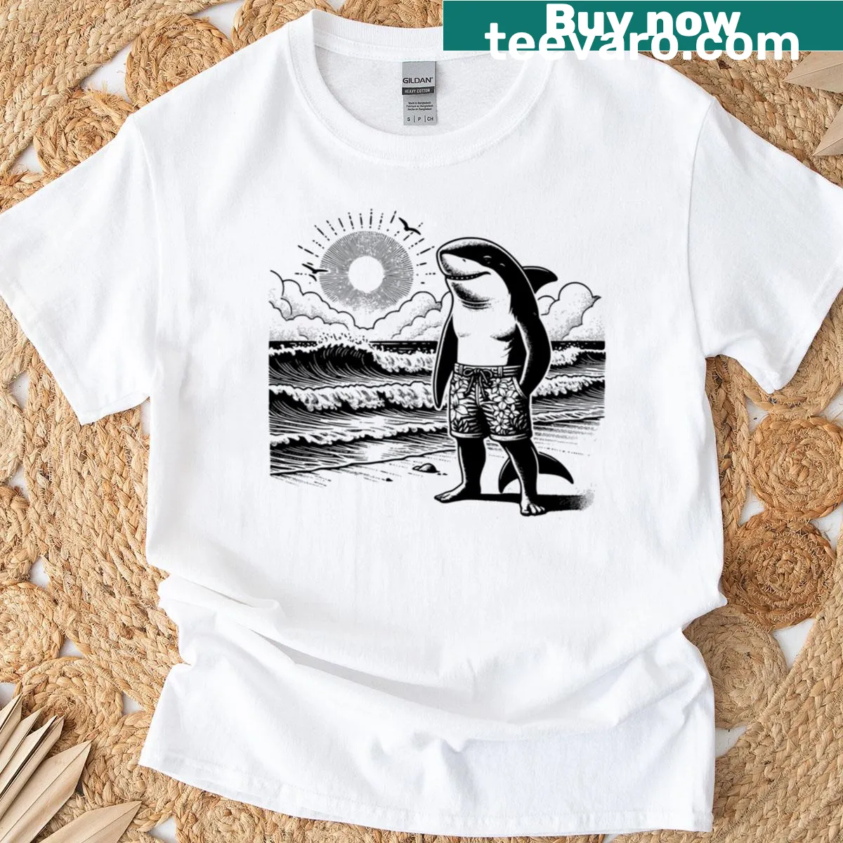 Funny T-shirt featuring a shark in swim trunks on a beach — on a men's t-shirt