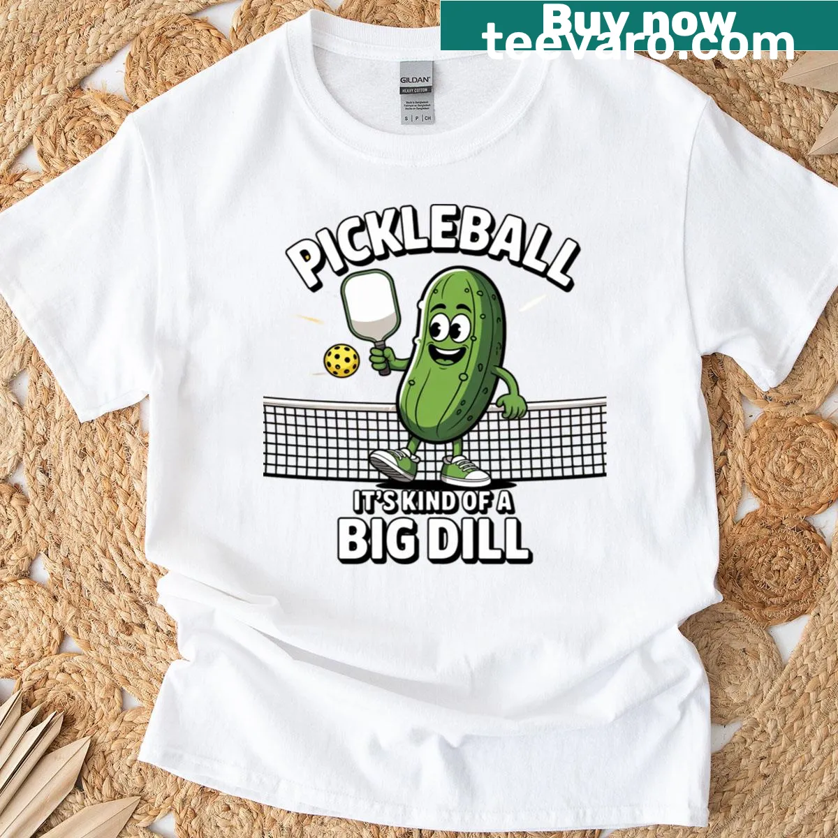 Funny pickleball T-shirt with a pickle and paddle graphic. — on a men's t-shirt