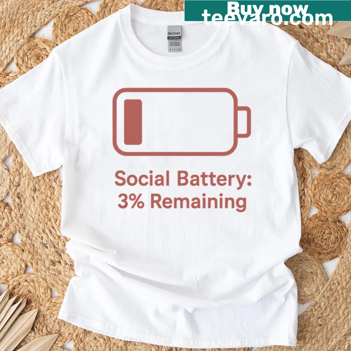 Minimalist t-shirt with low battery icon and humor about social energy — on a men's t-shirt