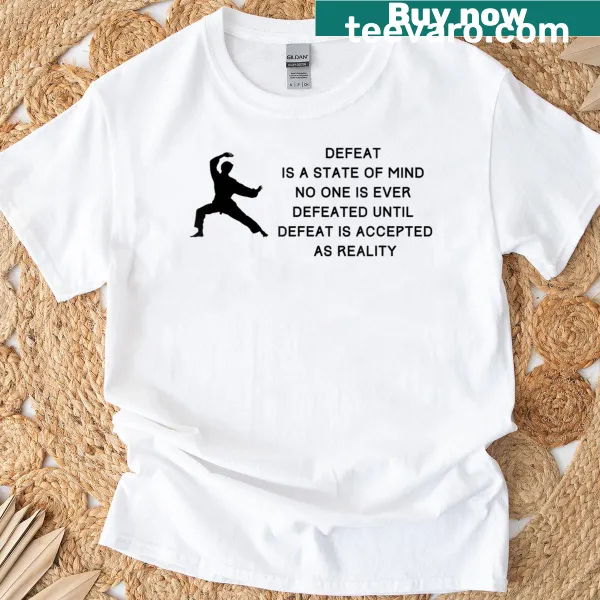 Inspirational T-shirt with 'Martial Arts Never Accept Defeat' text