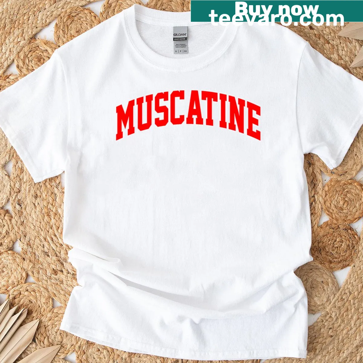 Vintage Muscatine College style t-shirt with a classic logo — on a men's t-shirt