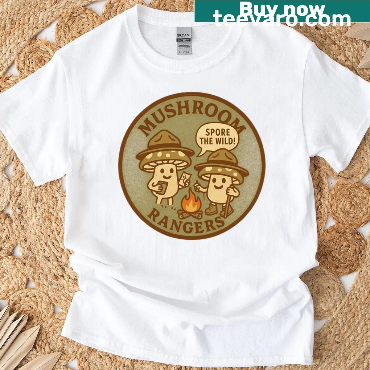 Outdoor adventure T-shirt with whimsical mushroom rangers illustration — on a men's t-shirt