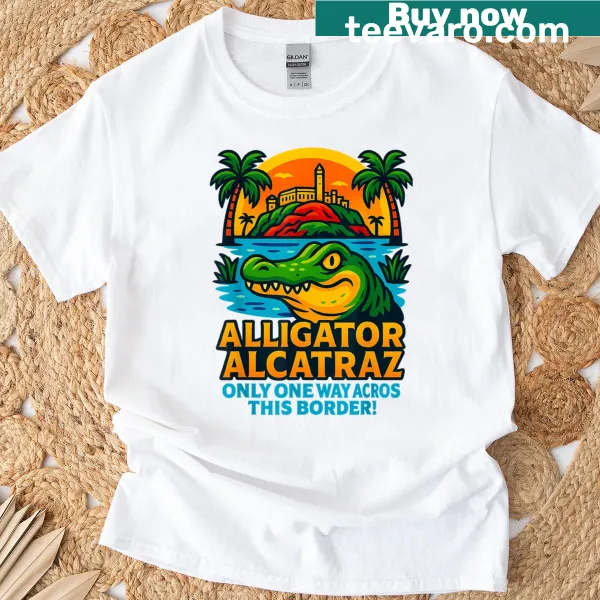 T-shirt with an alligator graphic and fun border crossing text