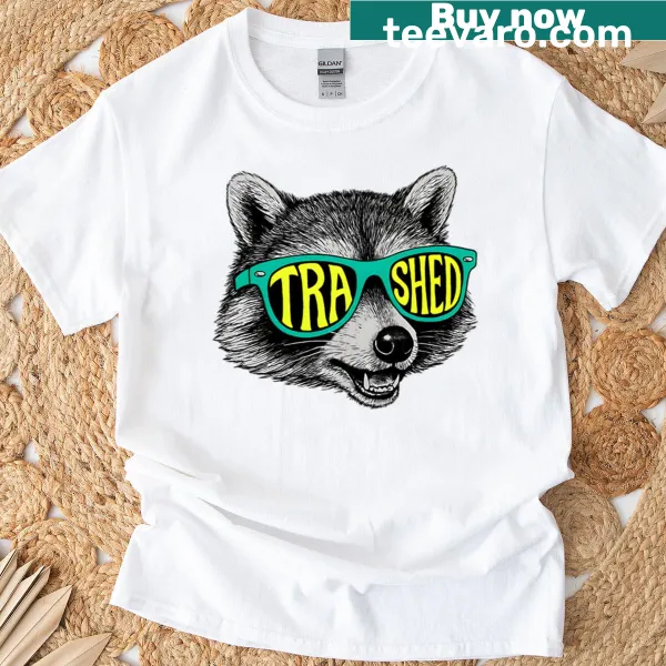 Playful t-shirt featuring a raccoon wearing teal sunglasses