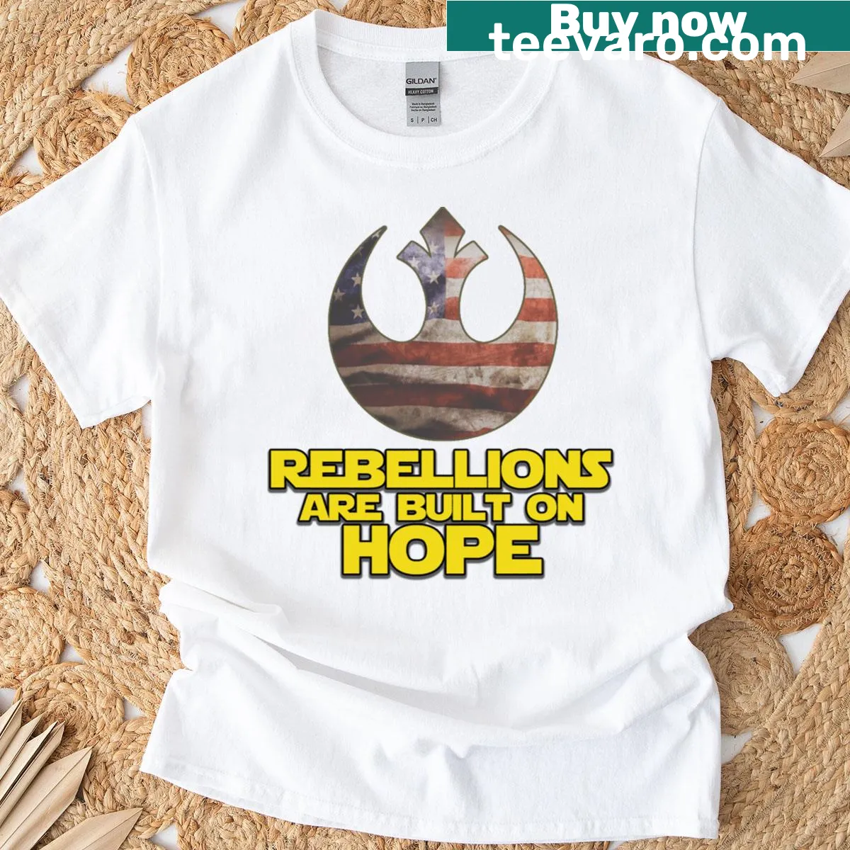 Inspirational T-shirt with the phrase 'Rebellions Are Built On Hope' — on a men's t-shirt