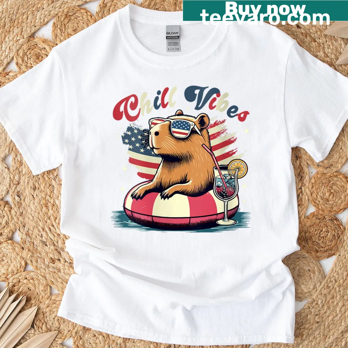 Capybara in costume with drink for 4th of July t-shirt — on a men's t-shirt
