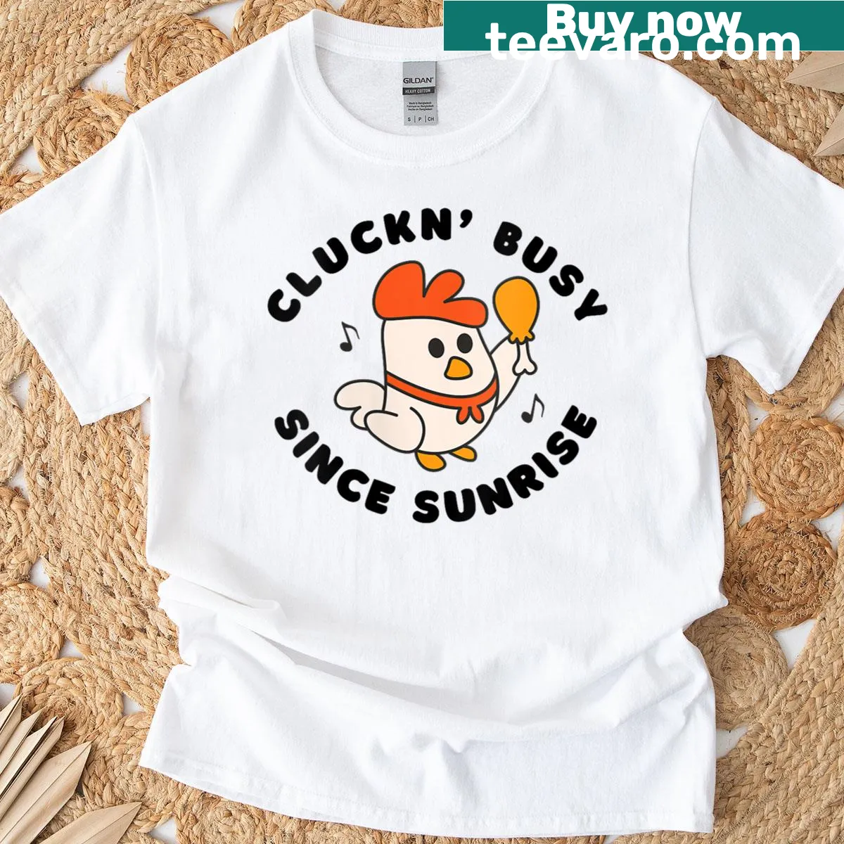 T-shirt featuring a hen with the phrase 'Cluckn Busy Since Sunrise' — on a men's t-shirt