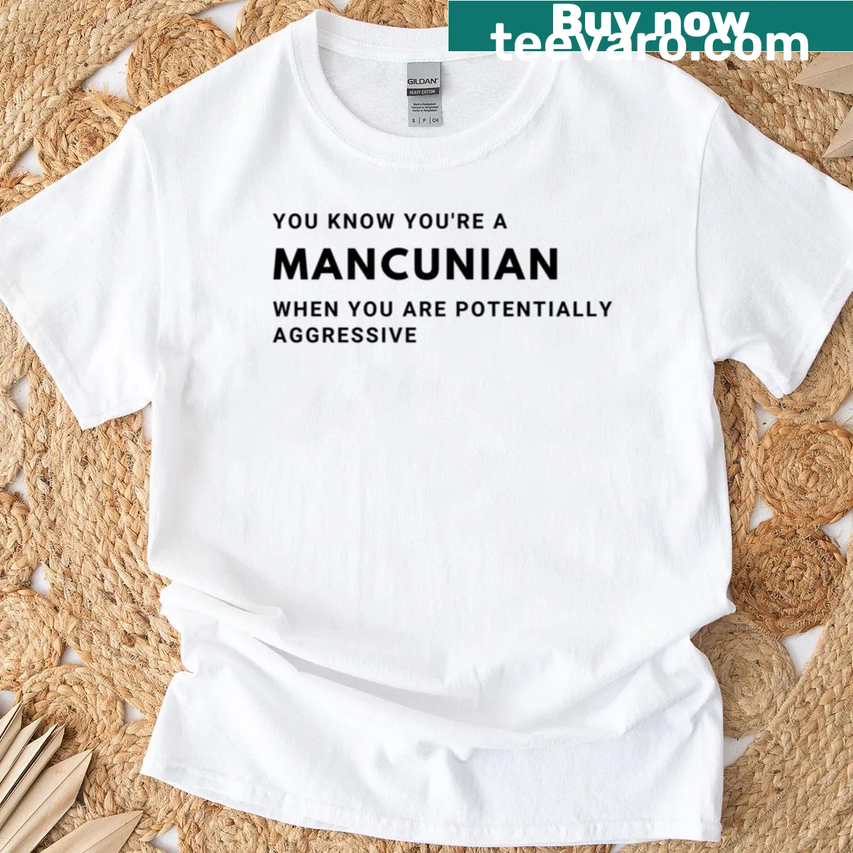 T-shirt featuring the phrase 'You Know Youre A Mancunian When You Are Potentially Aggressive.' — on a men's t-shirt