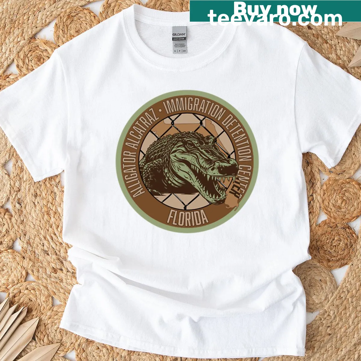 Mock seal design featuring alligator-Alcatraz theme for immigration commentary. — on a men's t-shirt