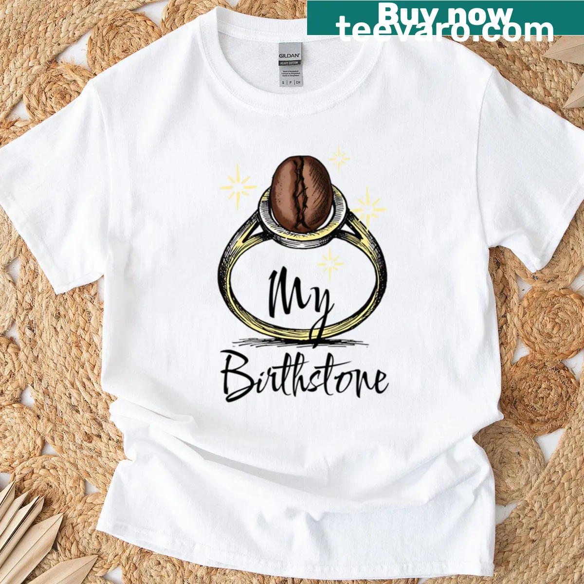 Coffee bean and birthstone ring graphic t-shirt — on a men's t-shirt