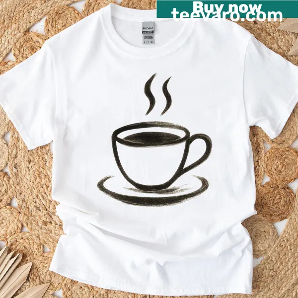 Minimalist line art coffee cup illustration in gold ink on a T-shirt