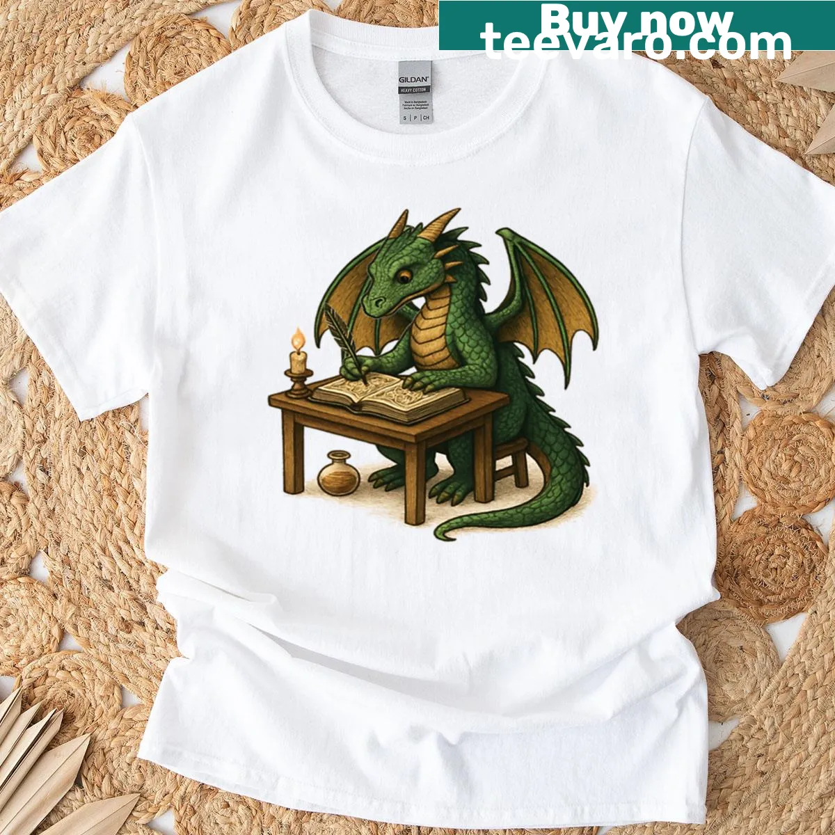 Illustration of a dragon writing a book on a t-shirt — on a men's t-shirt