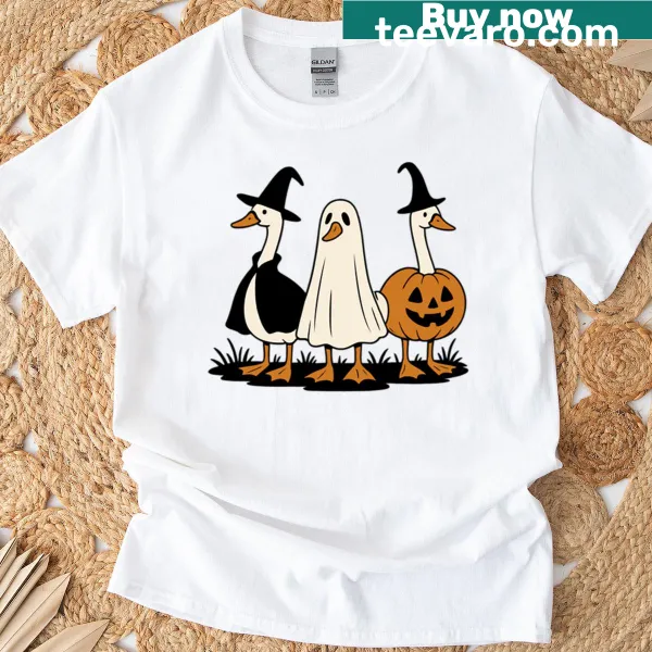 Funny Halloween t-shirt featuring a trio of cartoon ducks as a witch, ghost, and pumpkin