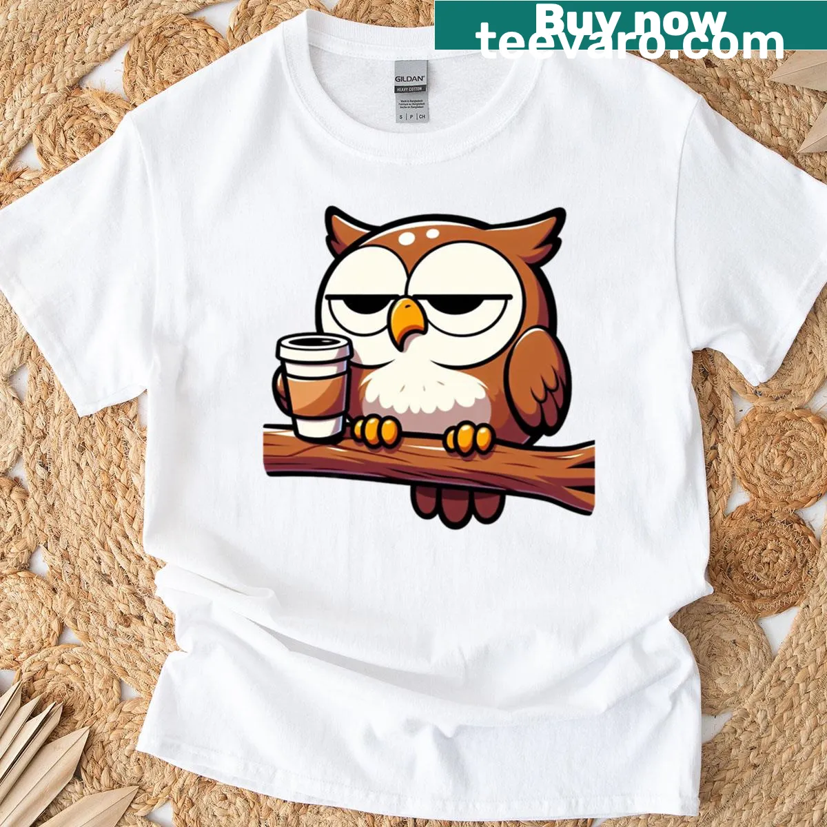 Cartoon grumpy owl with coffee design on a t-shirt — on a men's t-shirt
