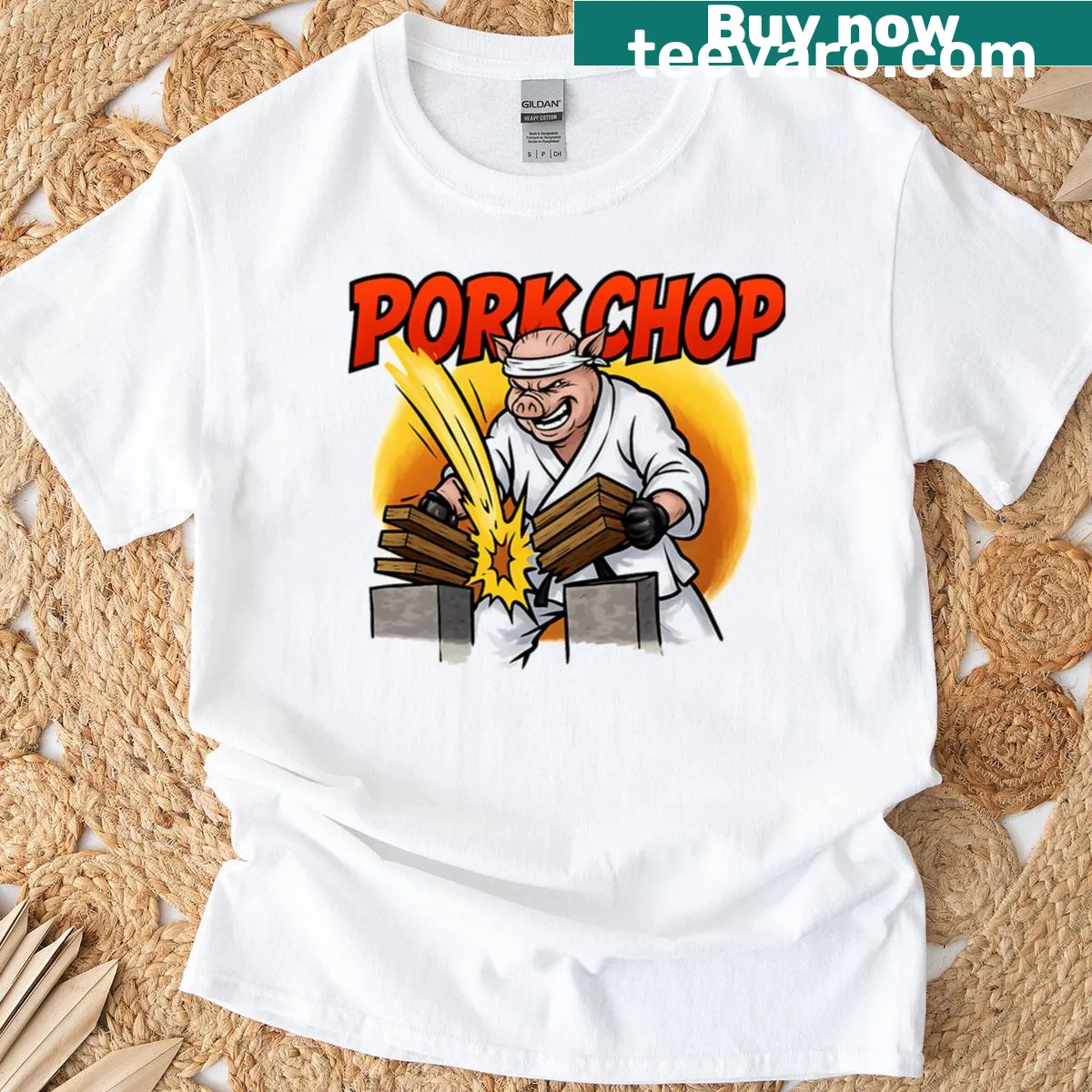 Oversized T-shirt with a cartoon karate pig graphic — on a men's t-shirt