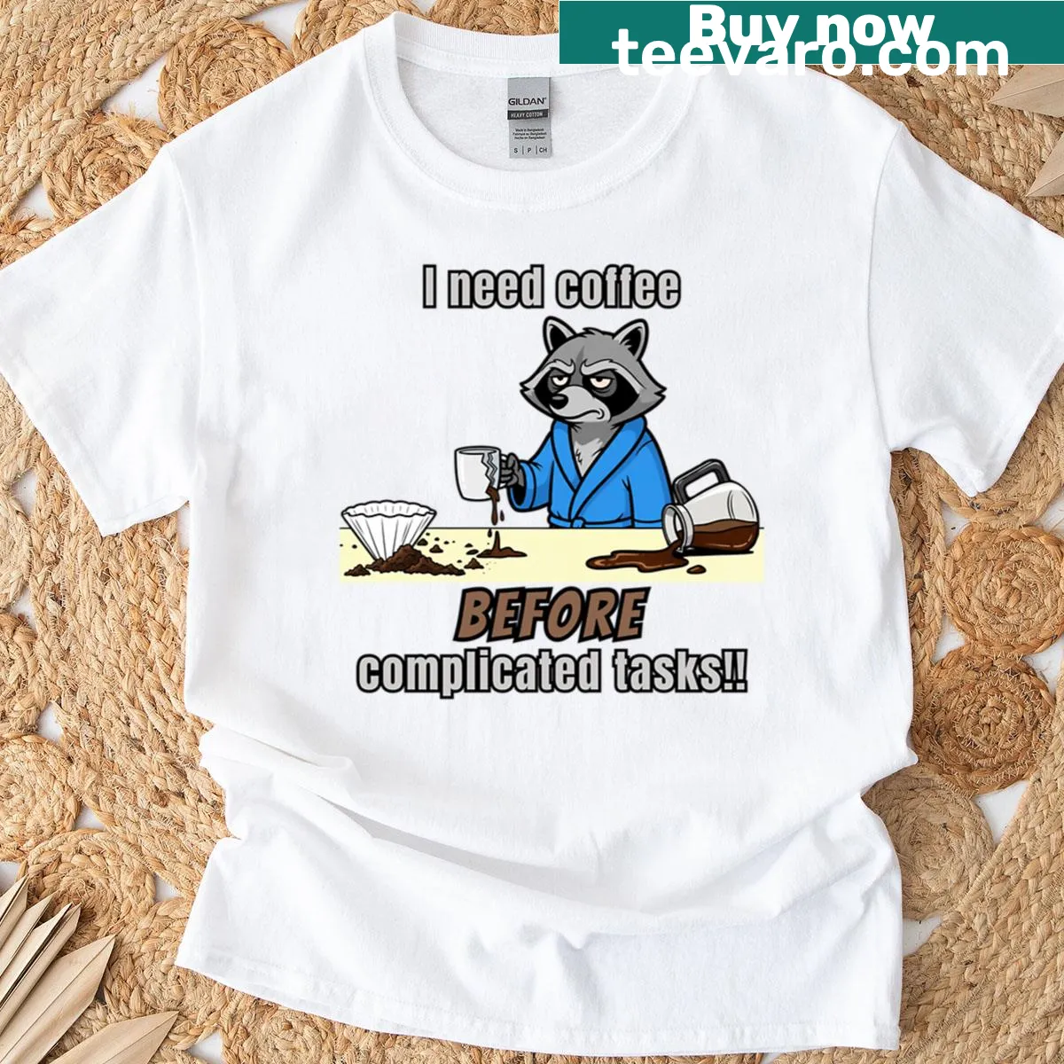 Whimsical raccoon design with coffee chaos on t-shirt — on a men's t-shirt