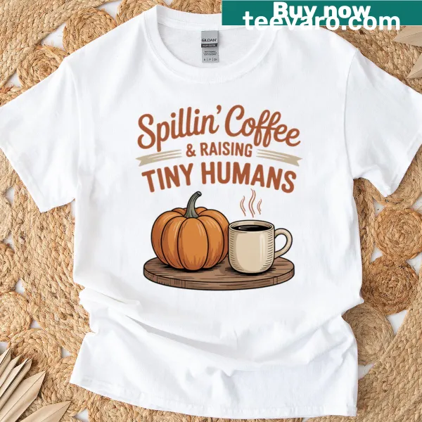 Text design stating 'Spillin Coffee Raising Tiny Humans' on a t-shirt