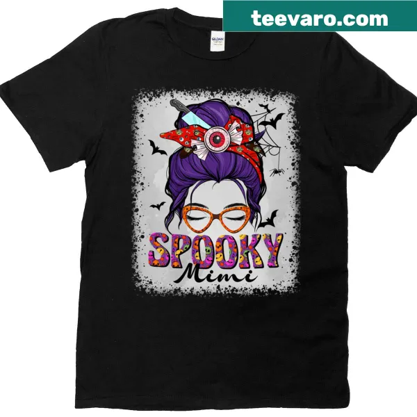 Cute Halloween tee with spooky character and messy hair bun design.