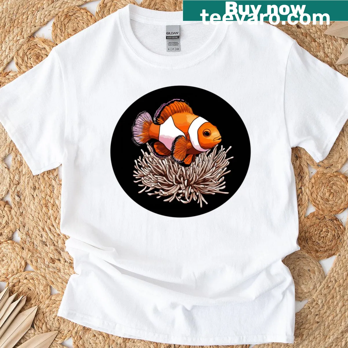 Clownfish swimming with anemone graphic — on a men's t-shirt