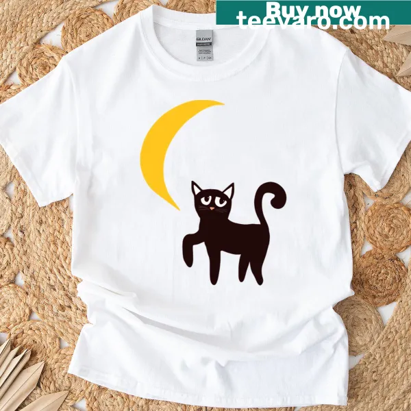 Whimsical illustration of a cat looking at the moon on a T-shirt