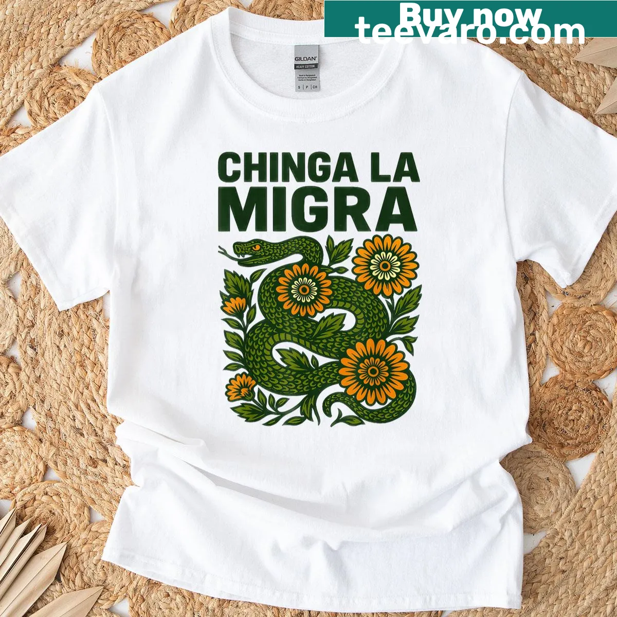 Vintage t-shirt featuring the phrase 'Chinga La Migra' with bold typography — on a men's t-shirt