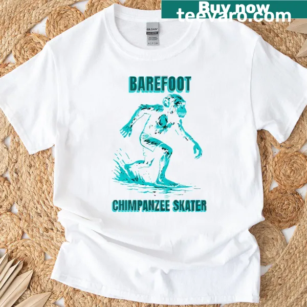 Playful surfing chimpanzee graphic on a turquoise t-shirt