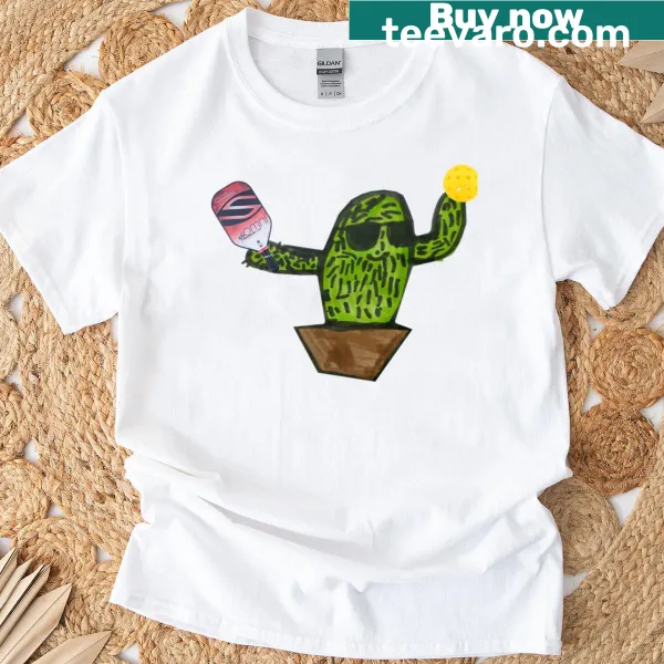 Cactus character playing pickleball graphic t-shirt