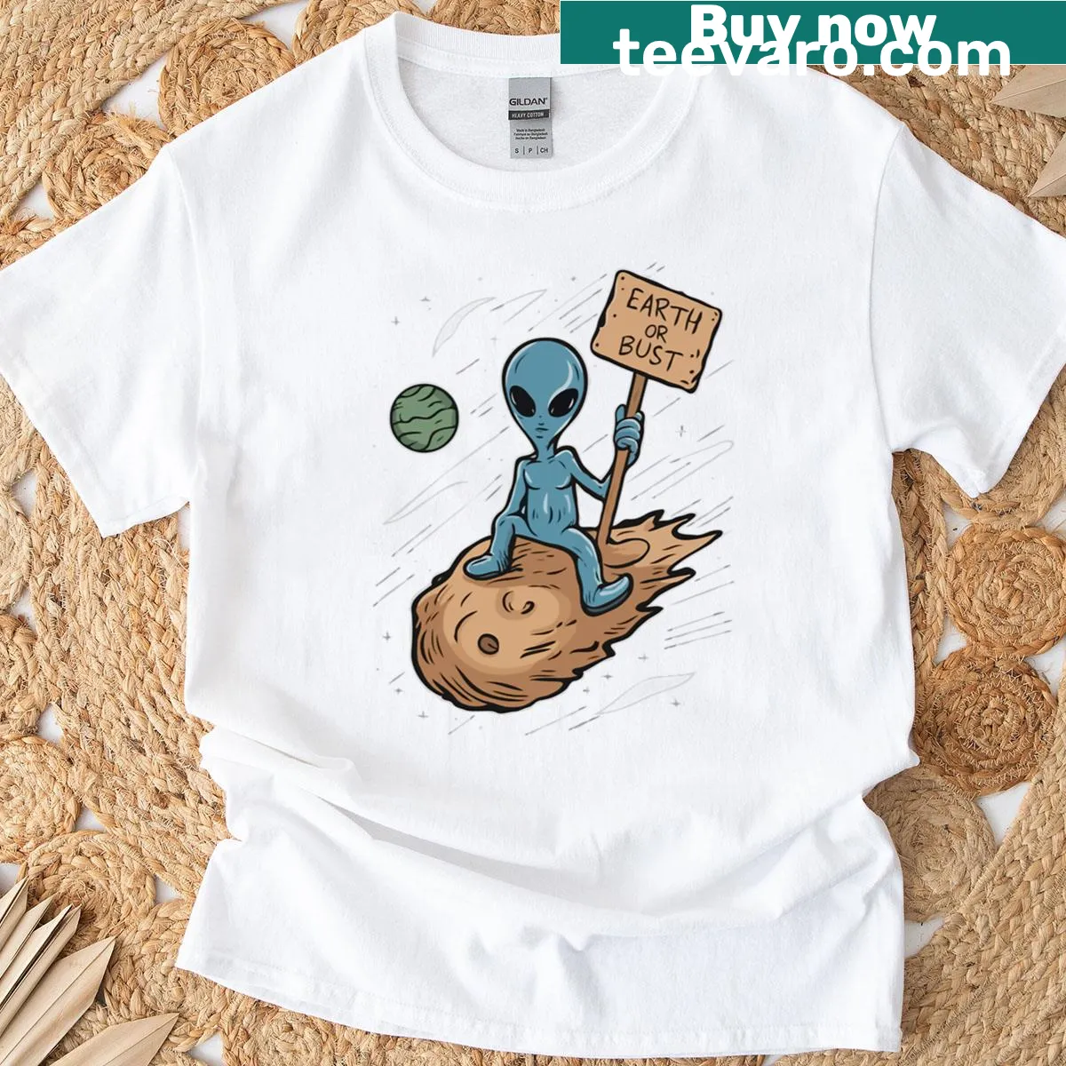 Oversized t-shirt featuring playful alien ride graphic — on a men's t-shirt
