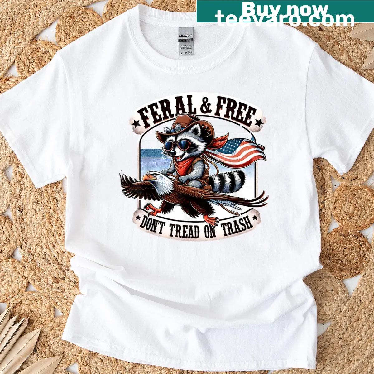 Patriotic T-shirt featuring a raccoon and 'Feral And Free' text — on a men's t-shirt