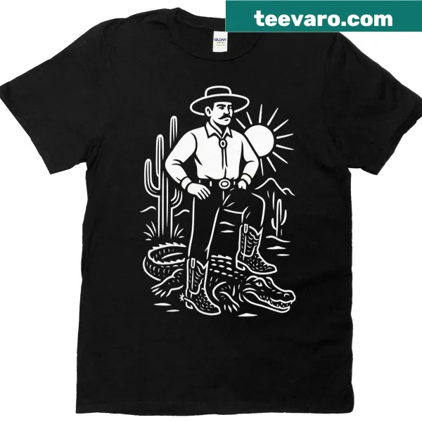 Playful alligator hunting graphic T-shirt with boots illustration.