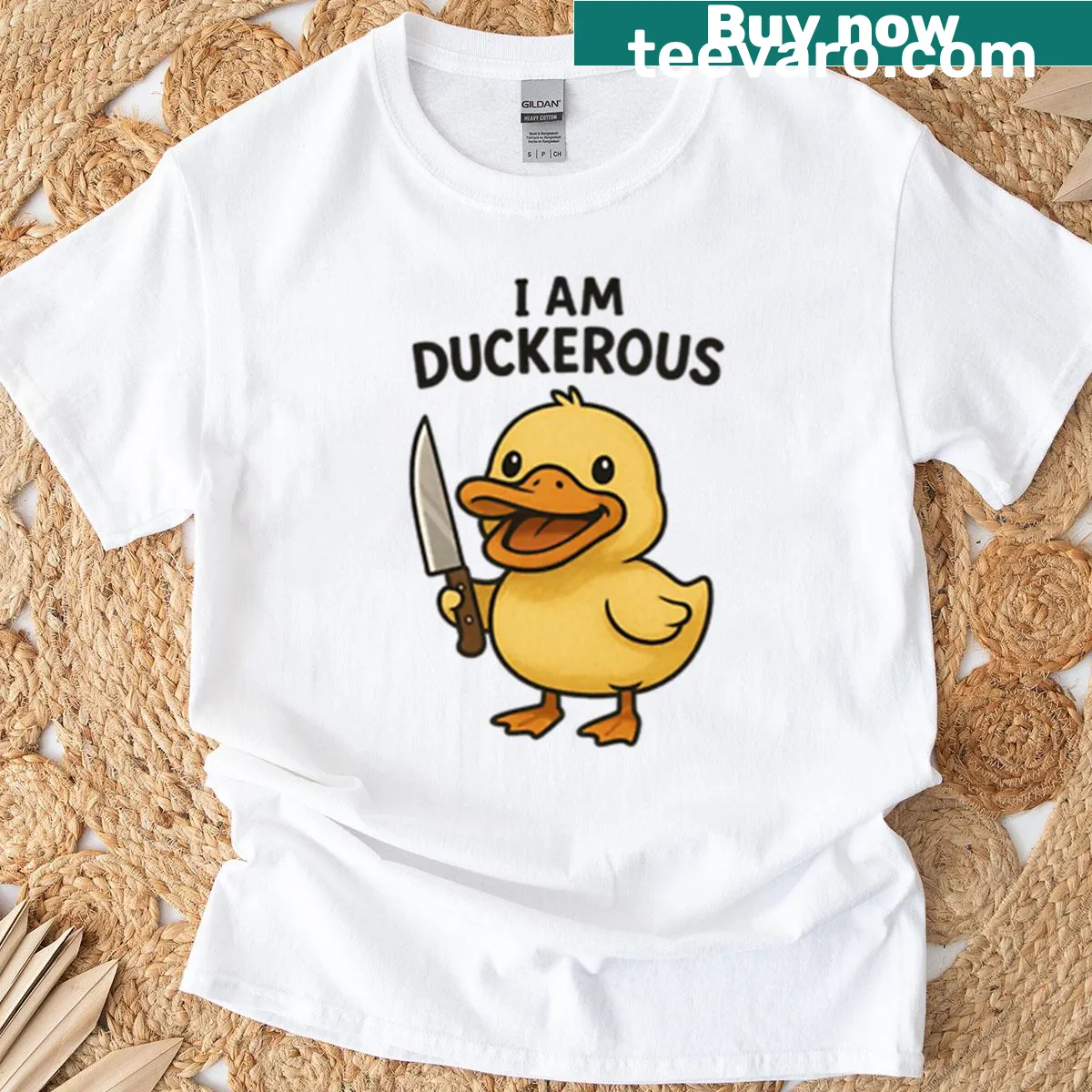 Cartoon design T-shirt featuring a duck with a knife and humorous text — on a men's t-shirt
