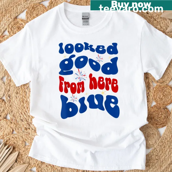 Blue t-shirt with bold text saying 'Looked Good From Here'