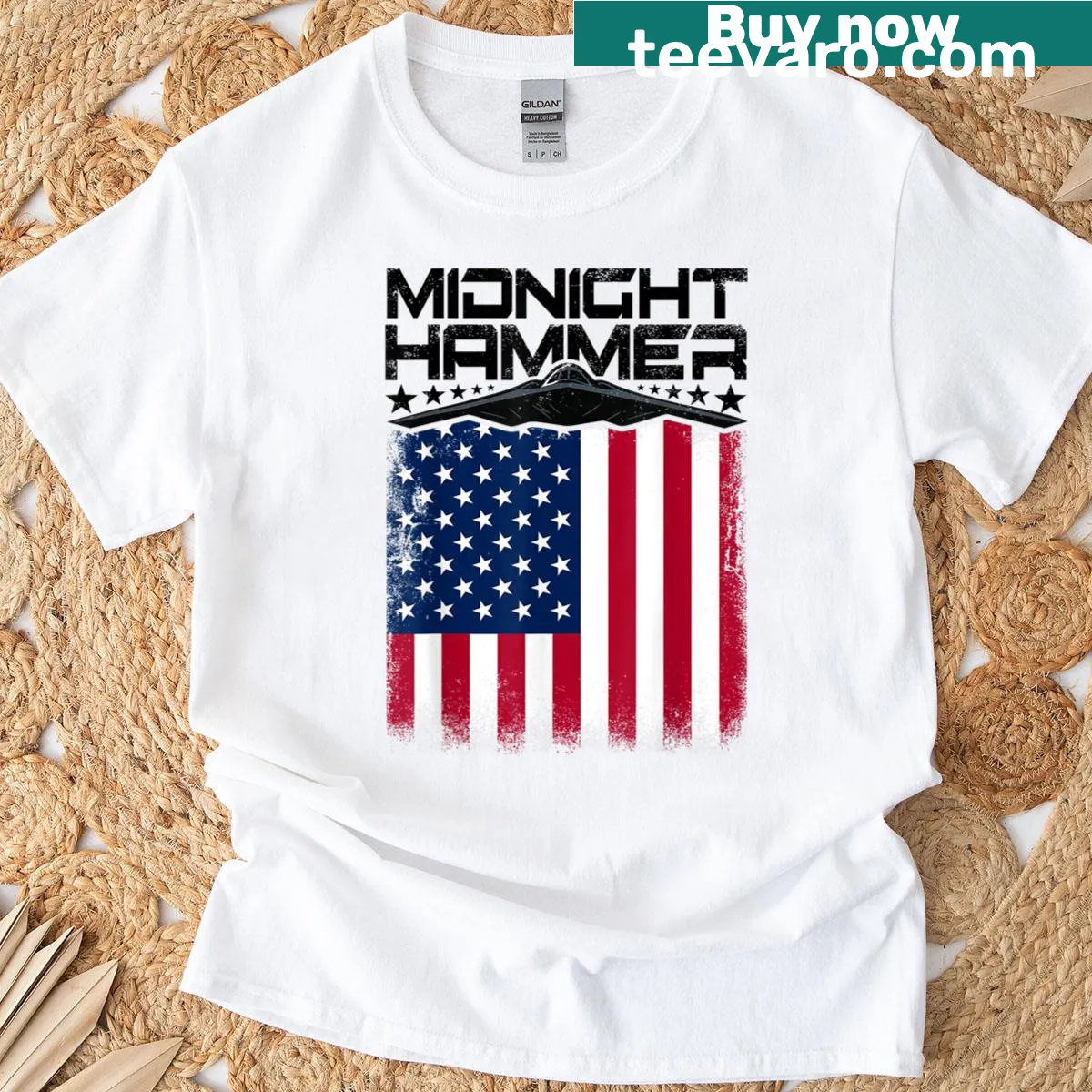 T-shirt featuring a graphic of the B-2 Stealth Bomber — on a men's t-shirt