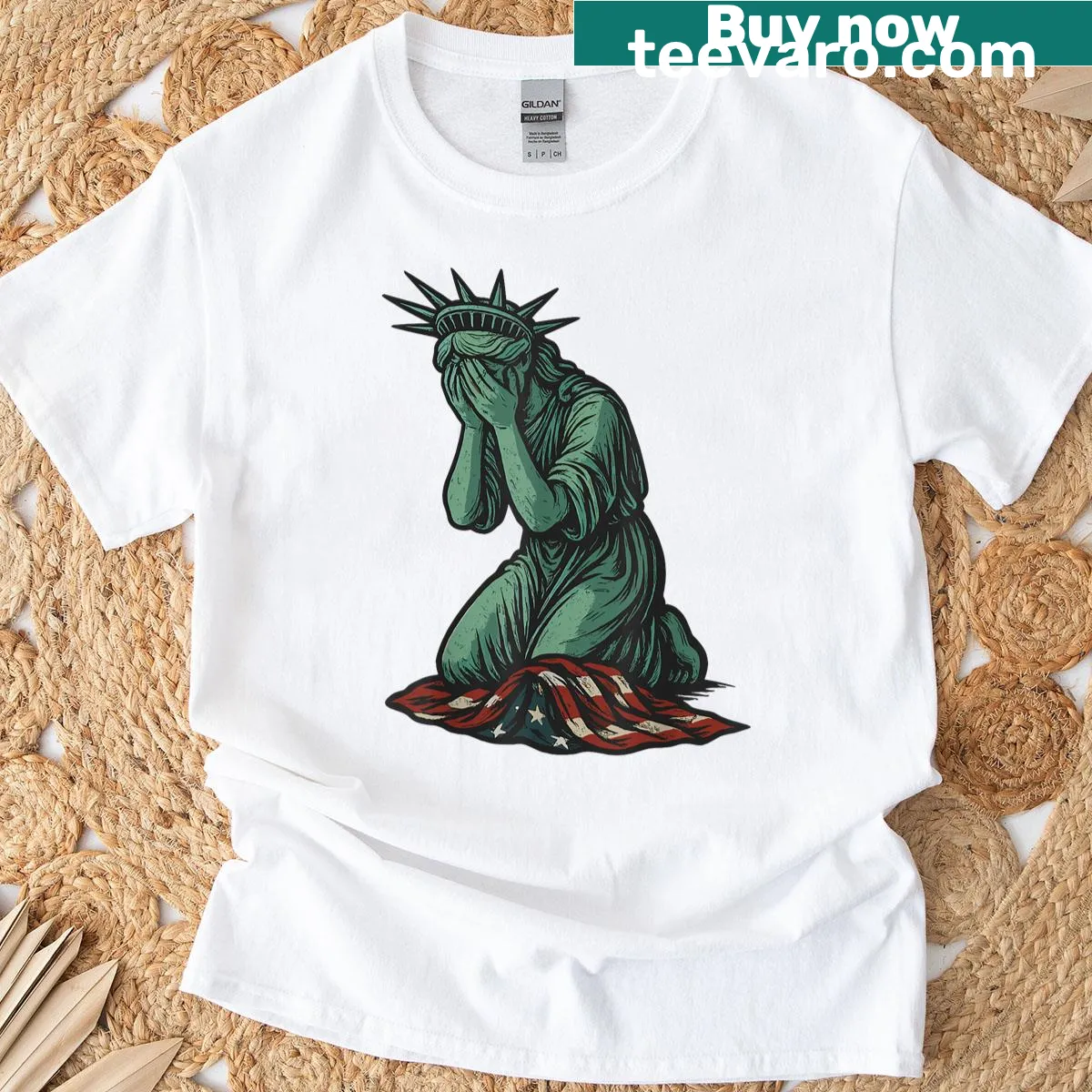 Illustration of a sorrowful Statue of Liberty with US flag on a t-shirt. — on a men's t-shirt