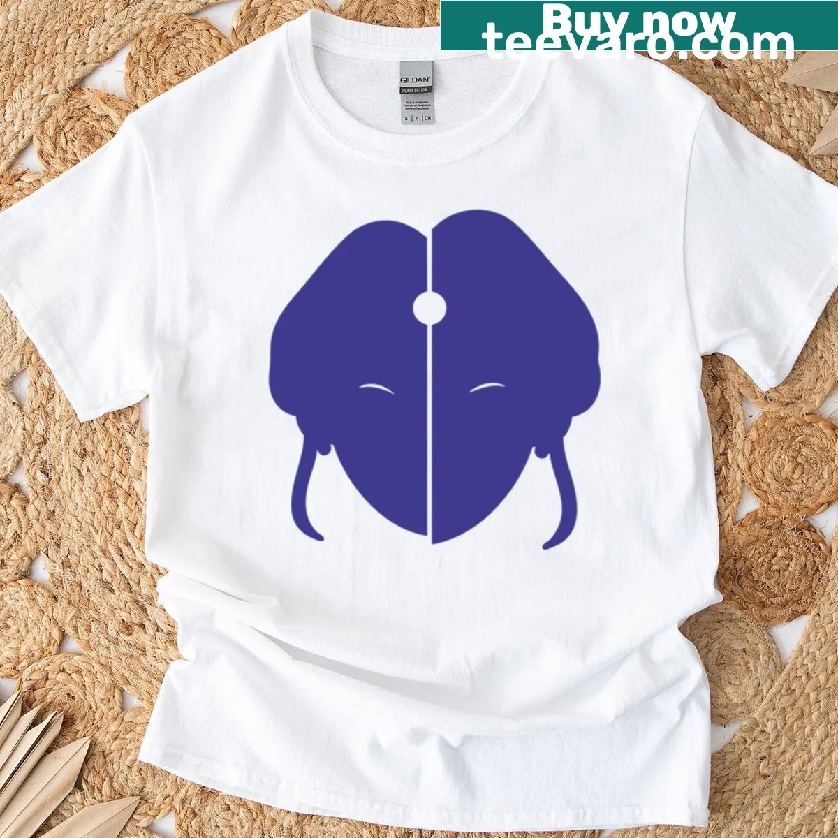 Minimalist oversized T-shirt with a prominent emblem design. — on a men's t-shirt