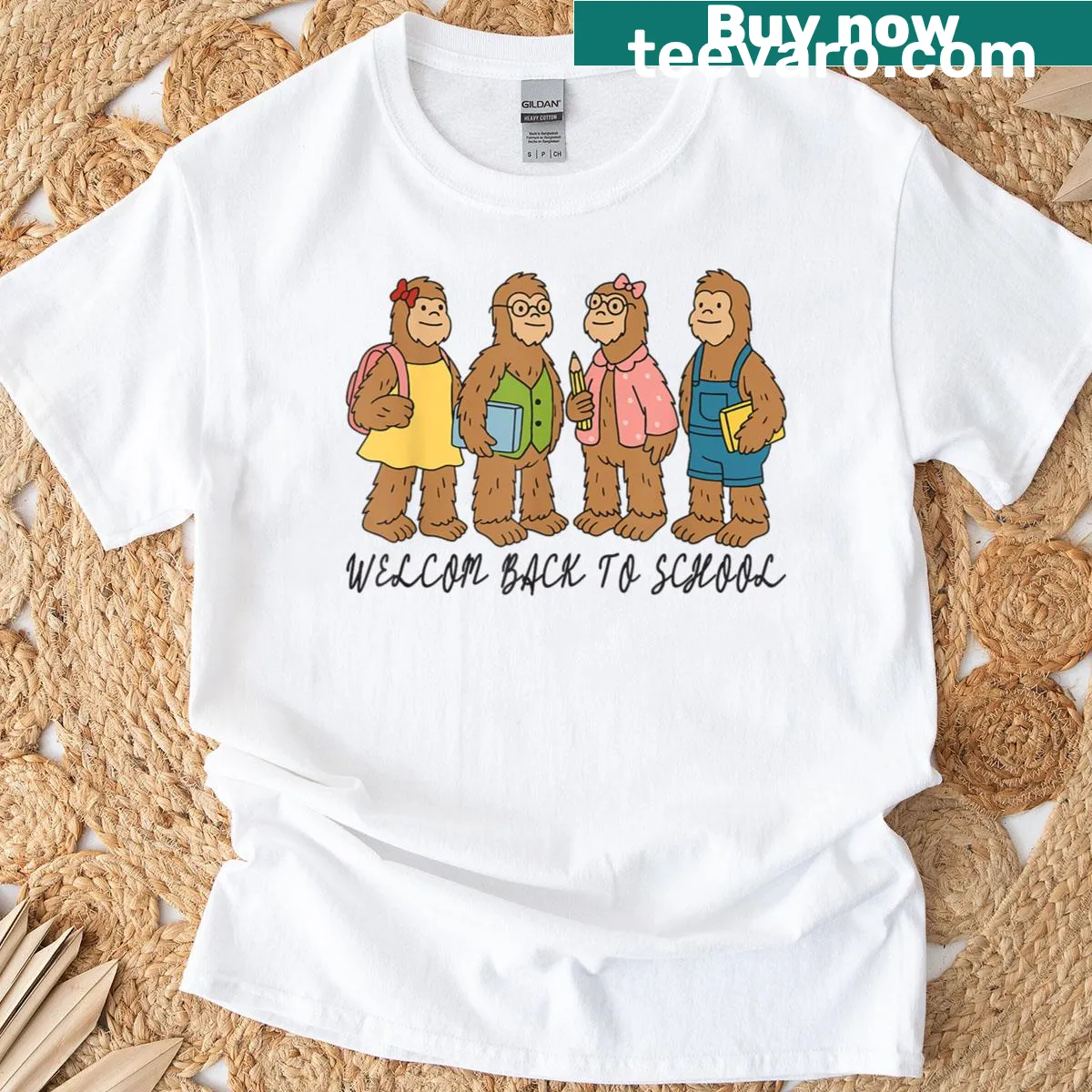 Back to school t-shirt featuring funny Bigfoot characters and books — on a men's t-shirt