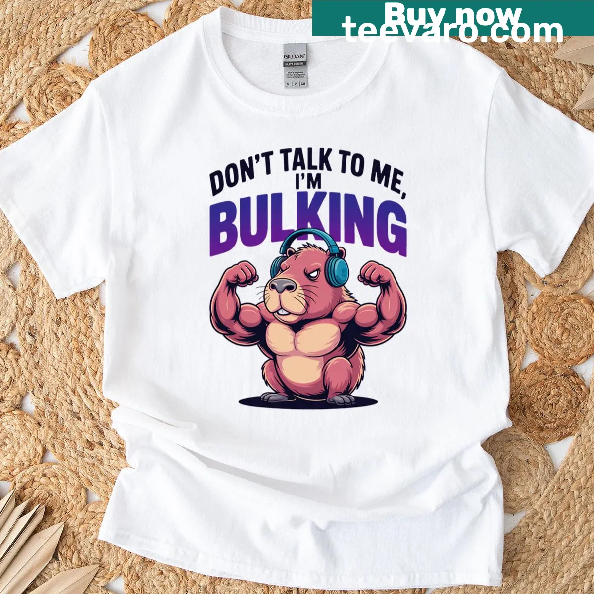 Oversized T-shirt featuring a humorous capybara gym meme. — on a men's t-shirt