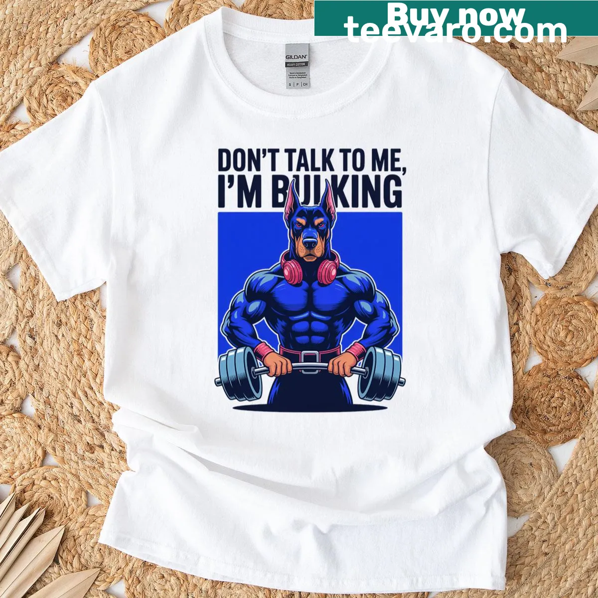 Funny dog-themed gym T-shirt with a cartoon dog lifting weights — on a men's t-shirt
