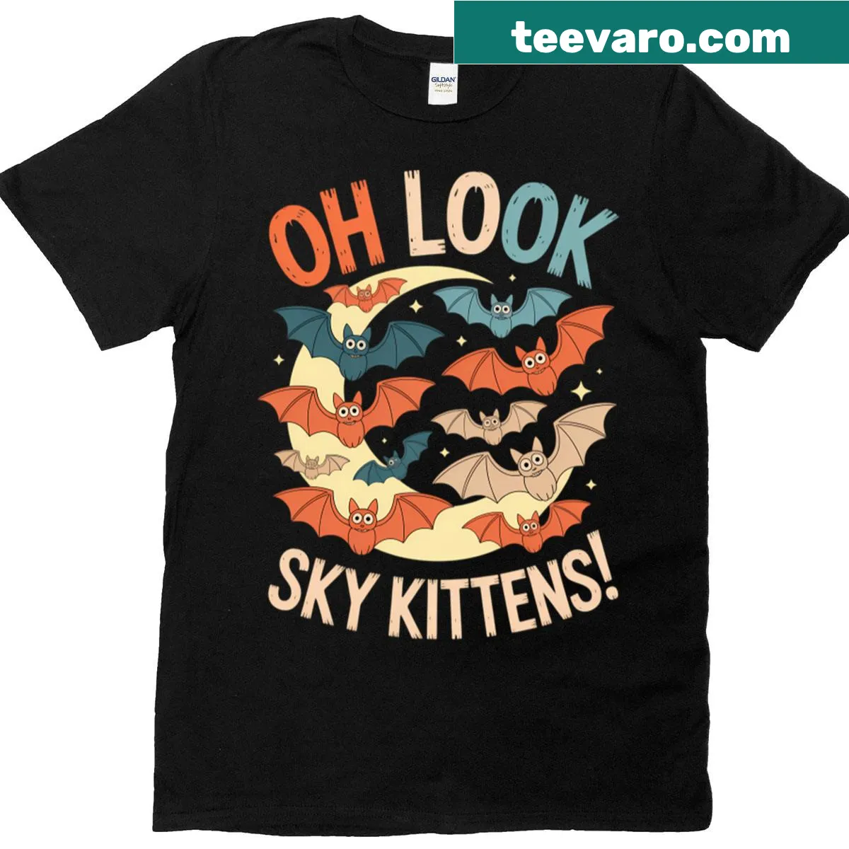 Funny T-shirt featuring an illustration of a kitten as a bat flying in the sky — on a men's t-shirt