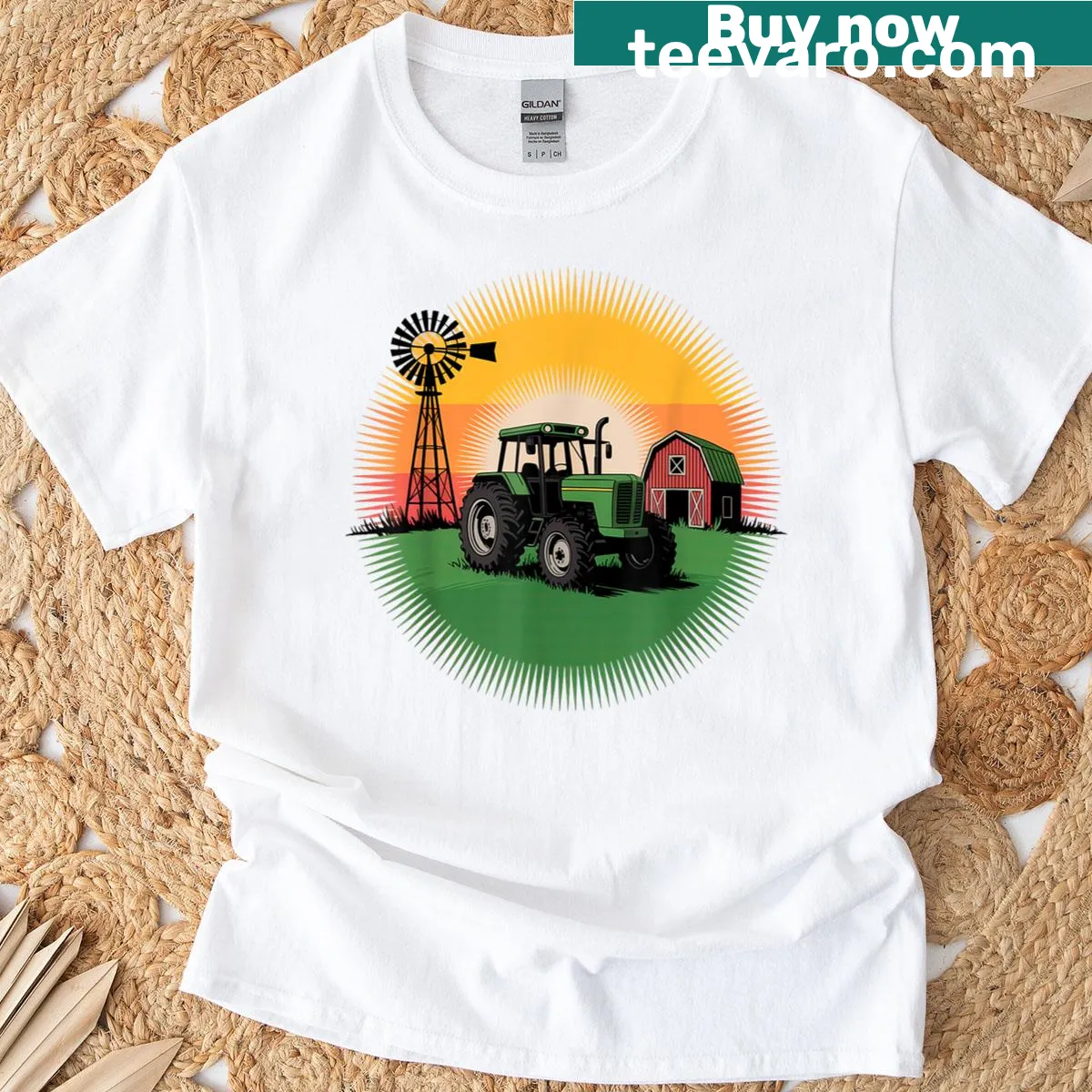 Illustration of a green tractor with barn and windmill at sunrise — on a men's t-shirt