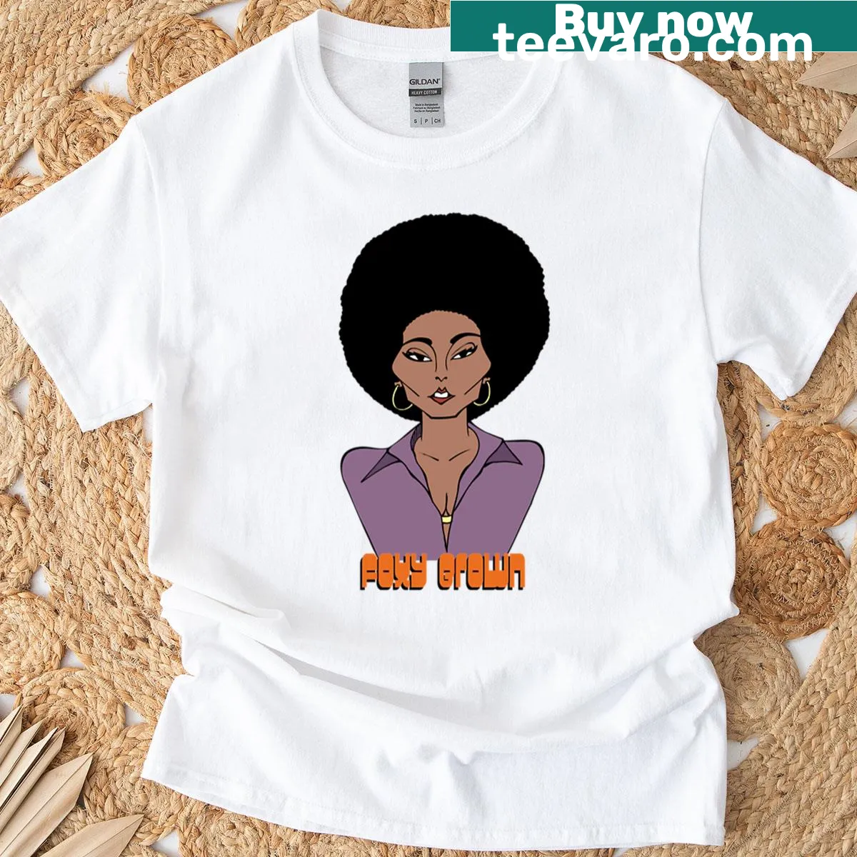 Oversized T-shirt featuring Pam Grier in a vintage film graphic. — on a men's t-shirt